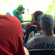 Illustration for article titled Bored Baseball Fans Play Baseball Video Games At Baseball Game